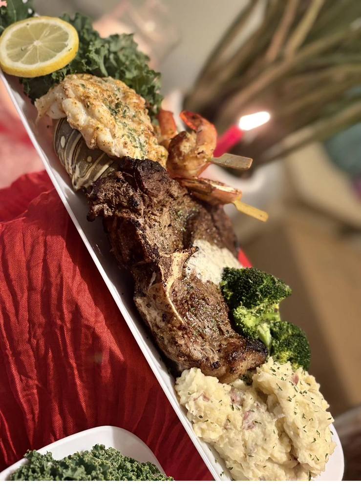 Flavor and Flair Catering Dinner for Two: Chef-prepared entrées beautifully plated for an intimate dining experience filled with flavor, elegance, and romance.