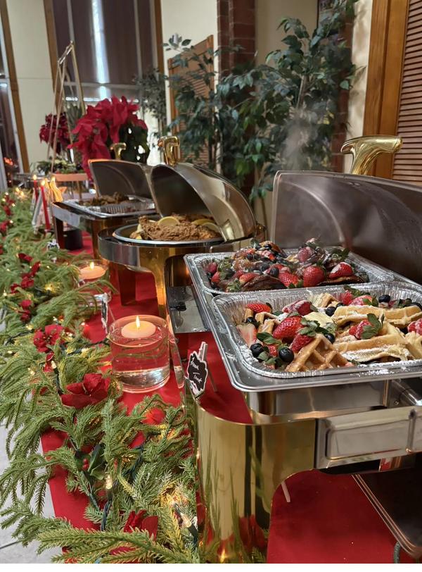 Flavor and Flair Catering Festive Brunch: A delightful holiday brunch featuring fresh fruit, warm waffles, and beautifully presented seasonal favorites.