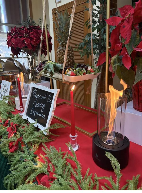 Flavor and Flair Catering Holiday Glow: Festive décor, candlelight, and warm ambiance create a memorable holiday dining experience.