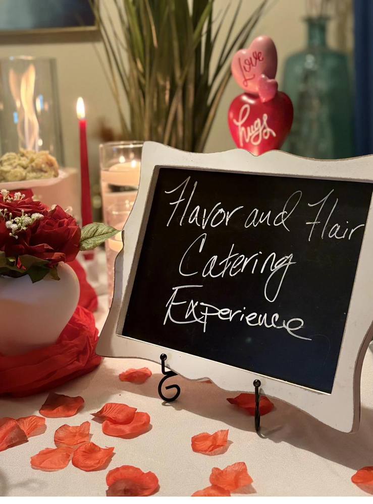 Flavor and Flair Catering Romantic Beginnings: An intimate tablescape designed with candlelight, fresh roses, and elegant details to create the perfect setting for two.