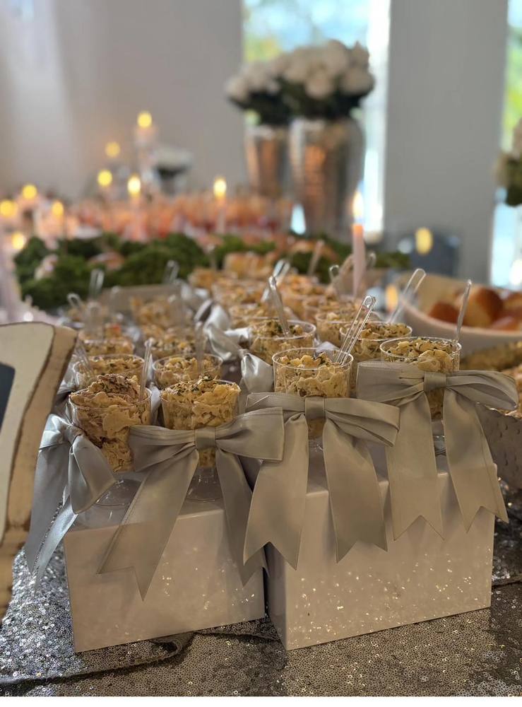 Flavor and Flair Catering Signature Servings individually prepared gourmet selections tied with elegant grey ribbons